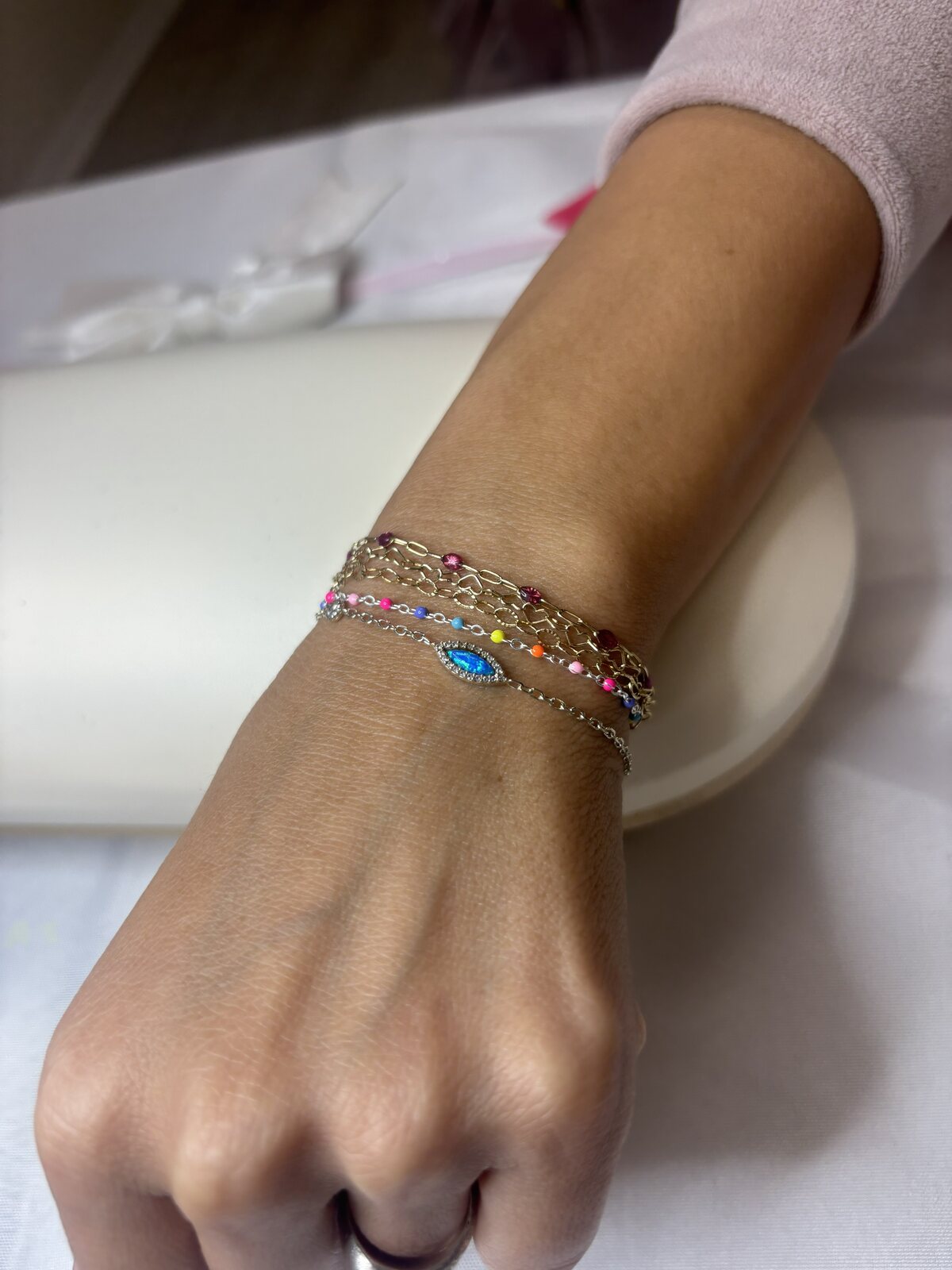 Colorful beaded and gold bracelet stack
